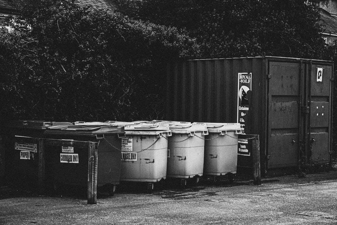 Free Grayscale Photography Of Trash Bins Stock Photo